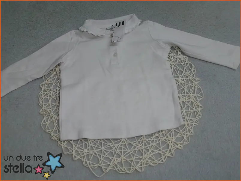 10340/24 - 9/12m maglia bianca OVS